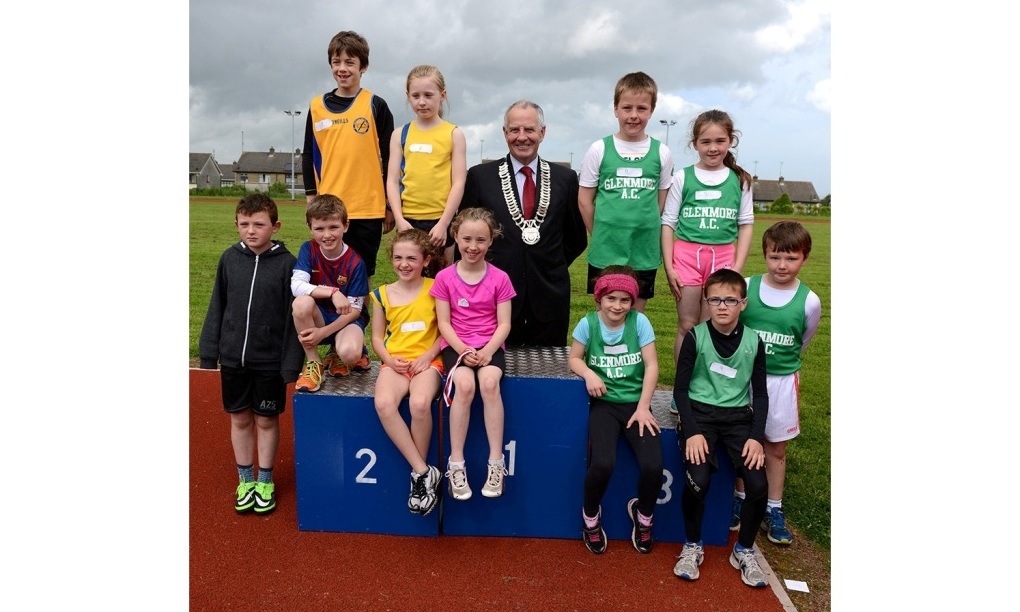 Oliver Tully, Chairperson of Louth County Council, with some athletes at County Athletics Finals (Drogheda, June 2014)